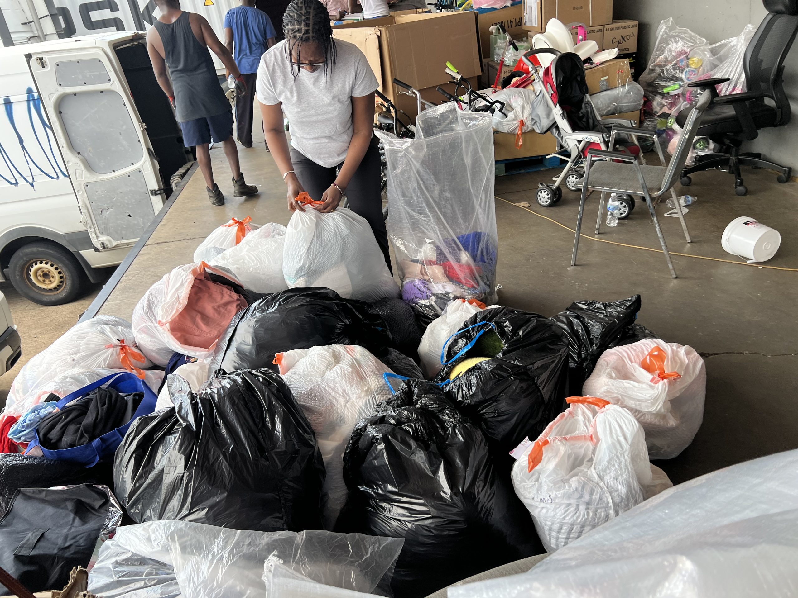 Volunteers at MACONA's hygiene kit packing event