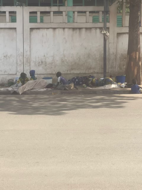 Family pictured sleeping on the streets in Mali