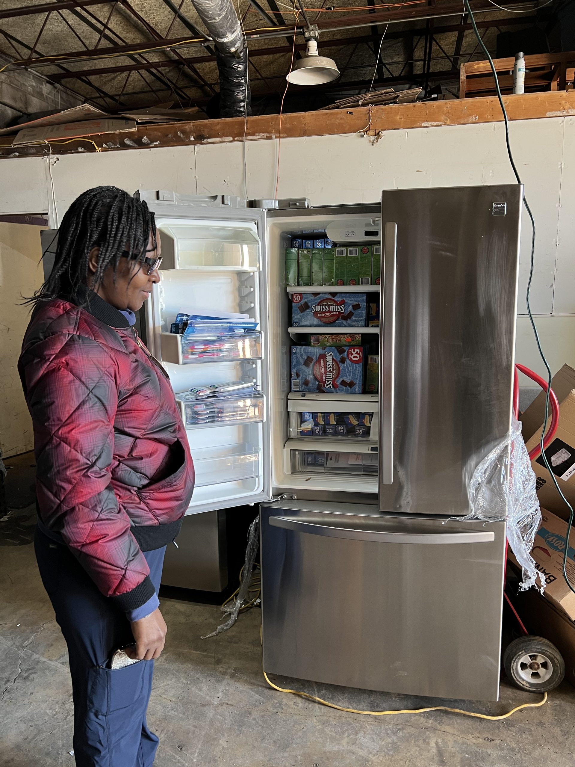 Mimi Williams checking stored food supplies