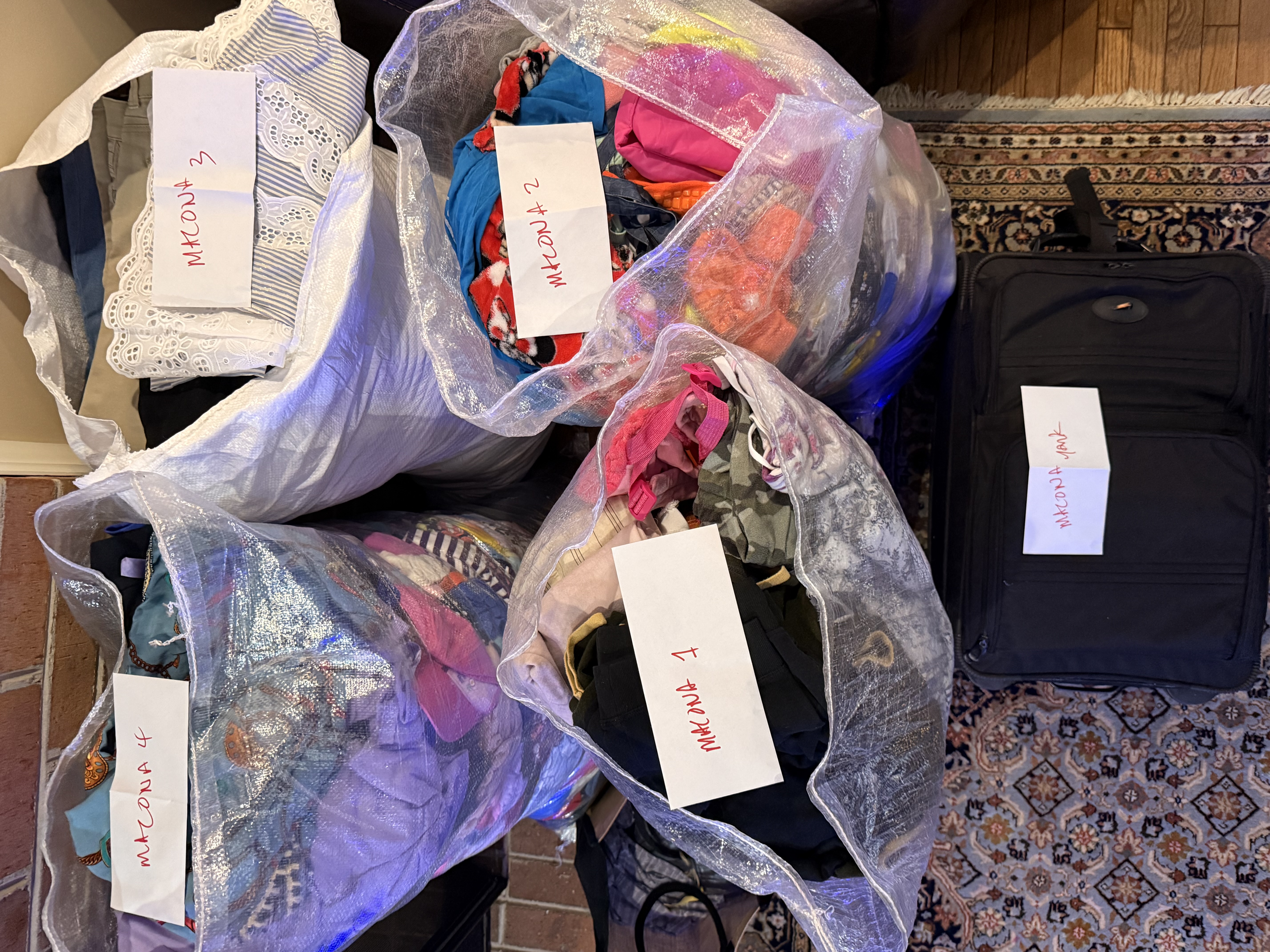 Bags packed in Maryland with all 4 trackers displayed