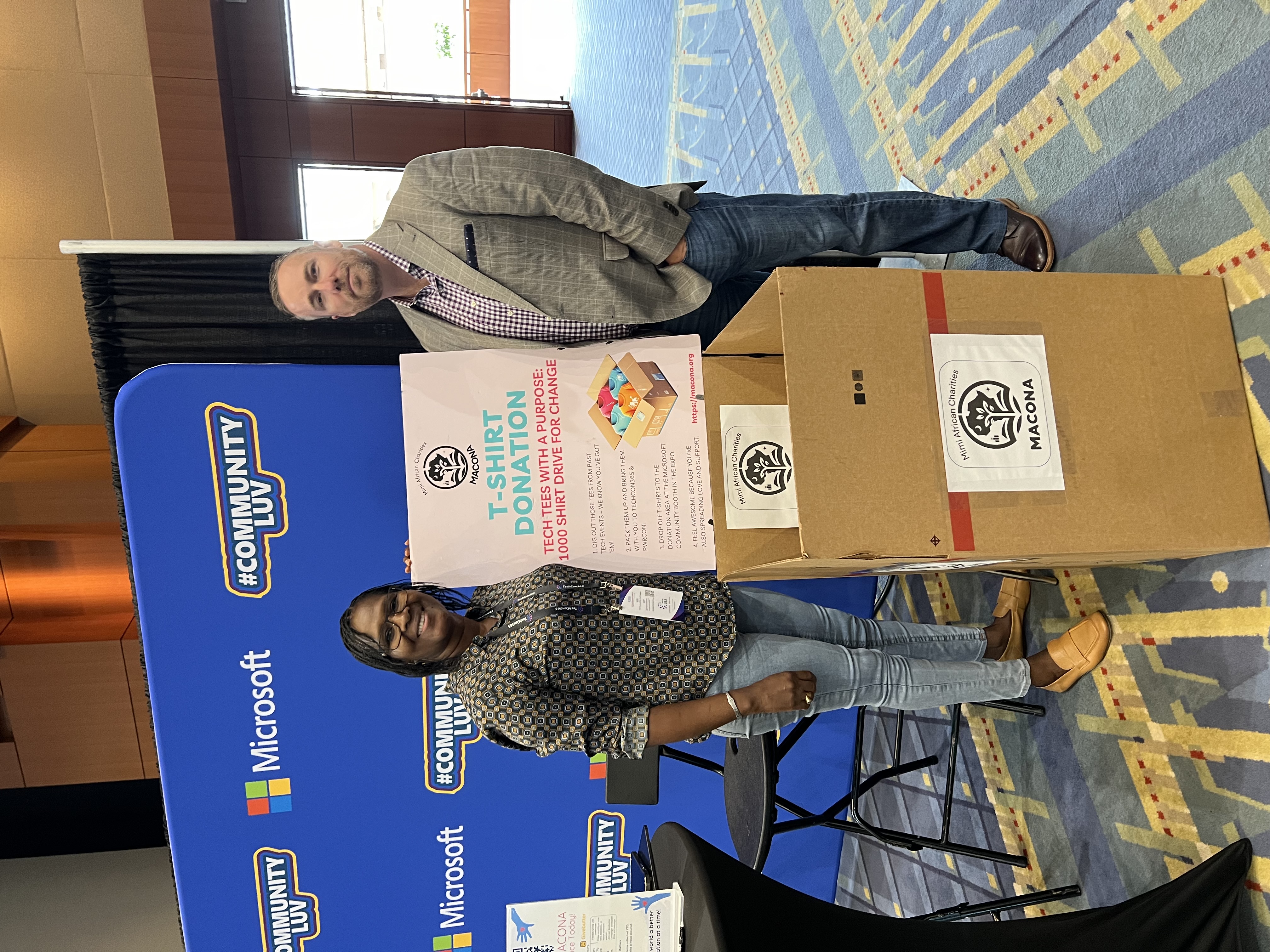 Mimi with the TechCon DC conference owner at the booth
